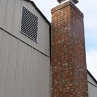 Repaired brick chimney