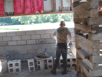 Contractor inspecting Charleston foundation