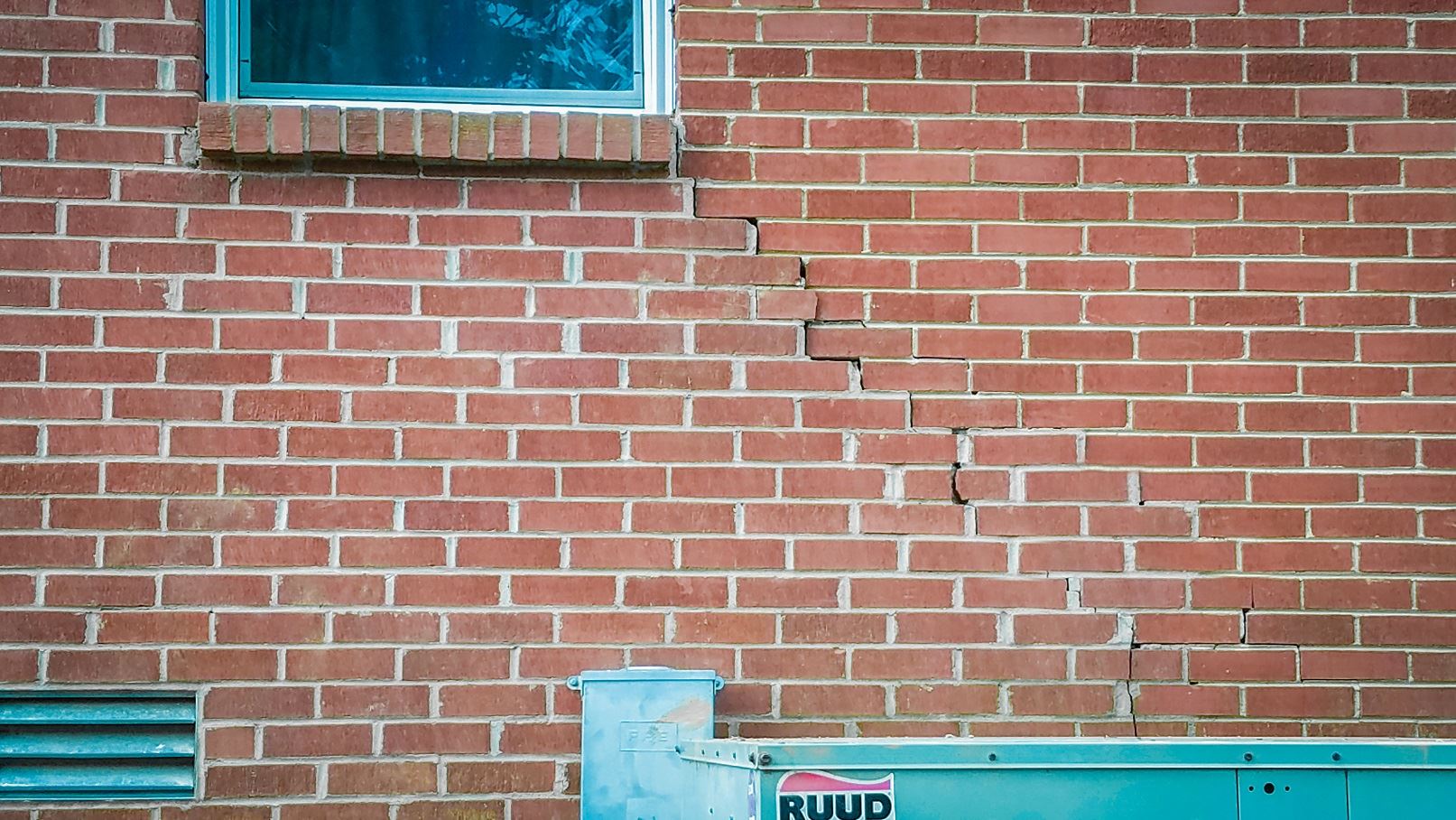 crack in brickwork of a home 